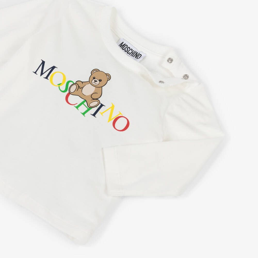 Moschino-Ivory Cotton Teddy Bear Top with Colourful Logo | Childrensalon Outlet