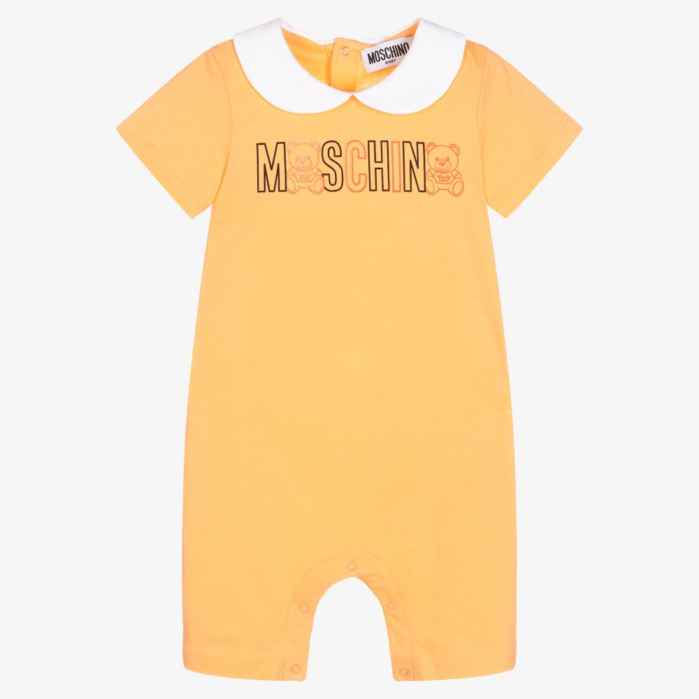 Moschino Baby - Оранжевый хлопковый песочник для малышей | Childrensalon