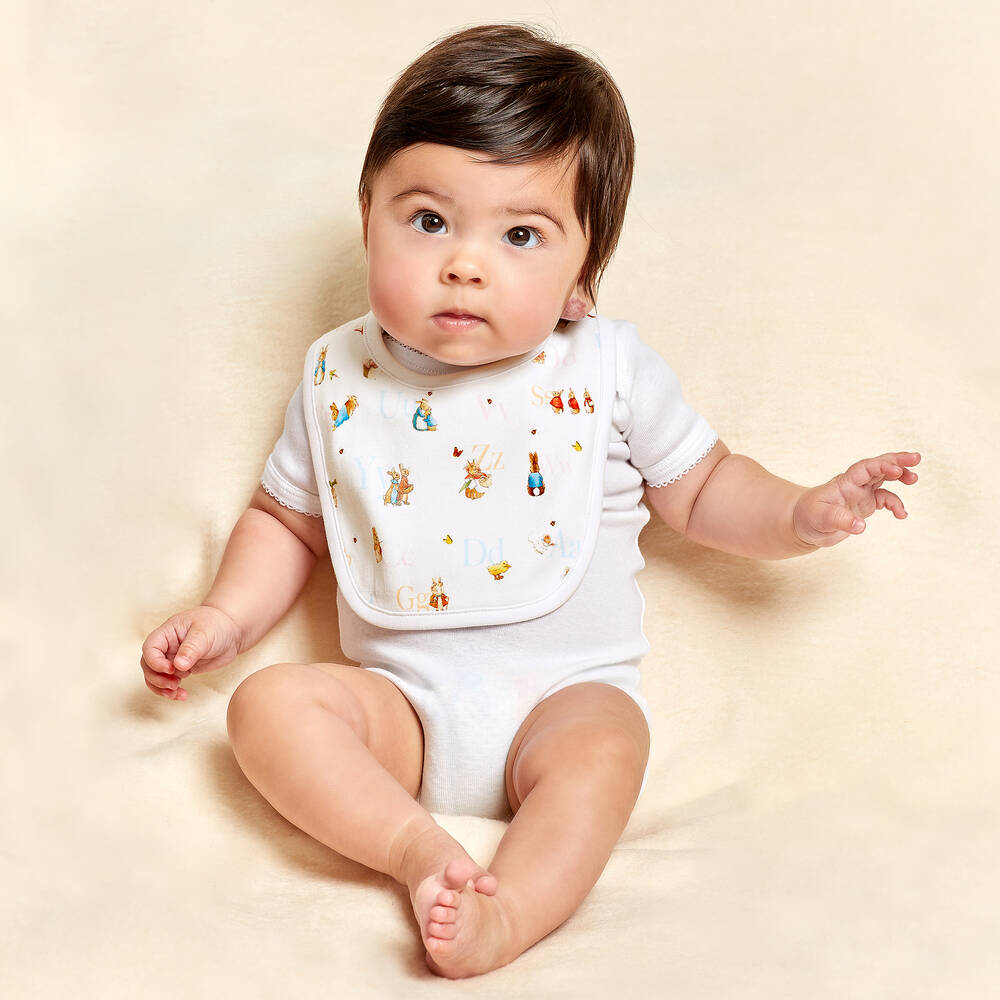 بيتر رابِت باي تشلدرن صالون-مريلة قطن لون أبيض للأطفال | Childrensalon Outlet