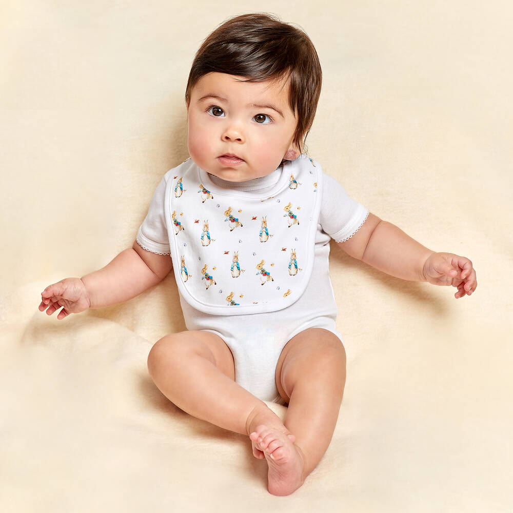 بيتر رابِت باي تشلدرن صالون-مريلة قطن لون أبيض للأطفال | Childrensalon Outlet