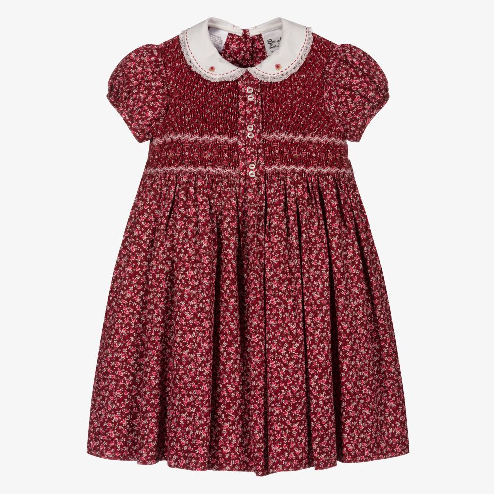 Sarah Louise - Robe fleurie rouge à smocks faits main  | Childrensalon