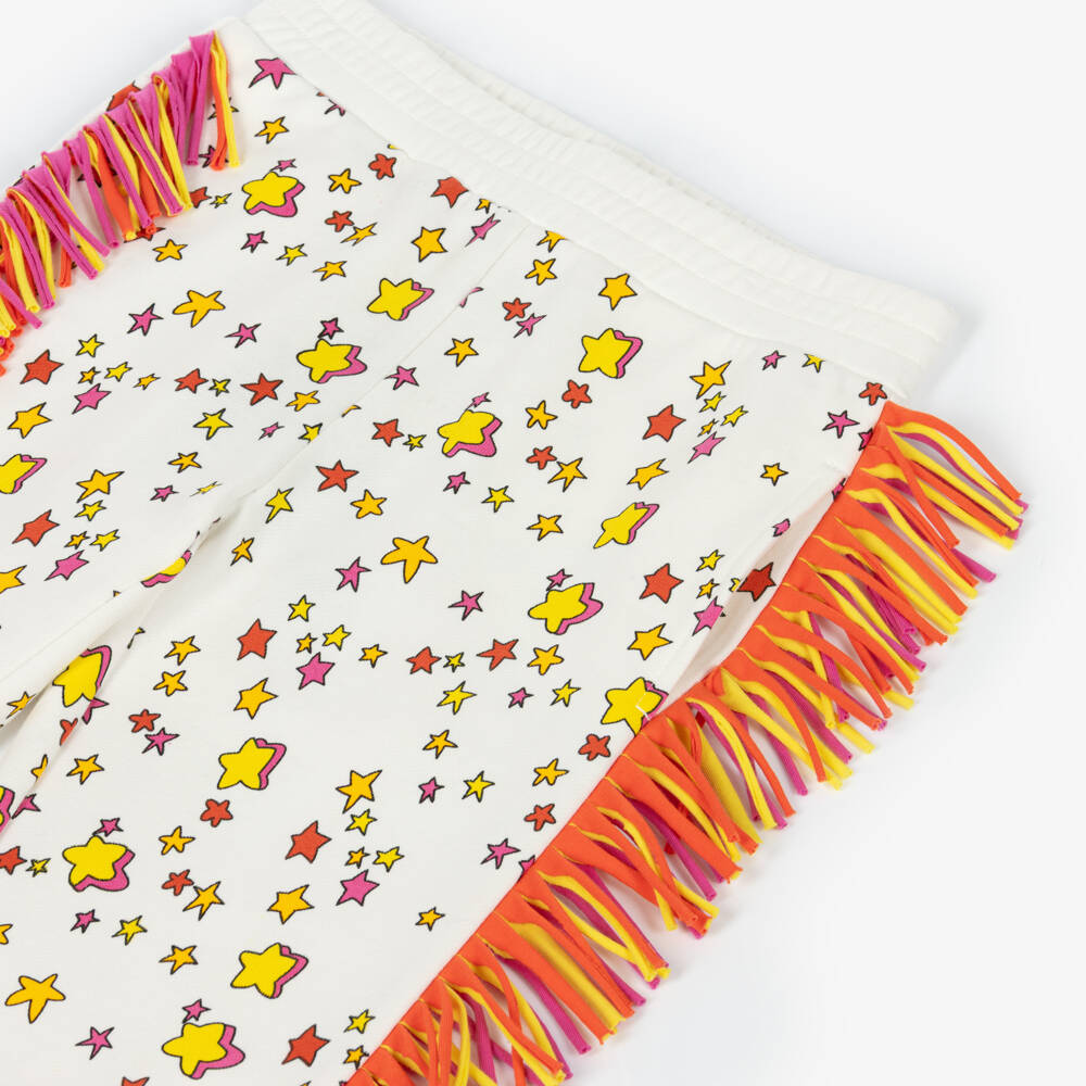 Stella McCartney Kids-Girls White Fringed Cotton Joggers with Star Print | Childrensalon Outlet