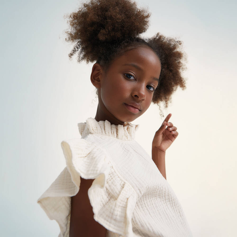 The New Society Girls Ivory Cotton Ruffle Blouse