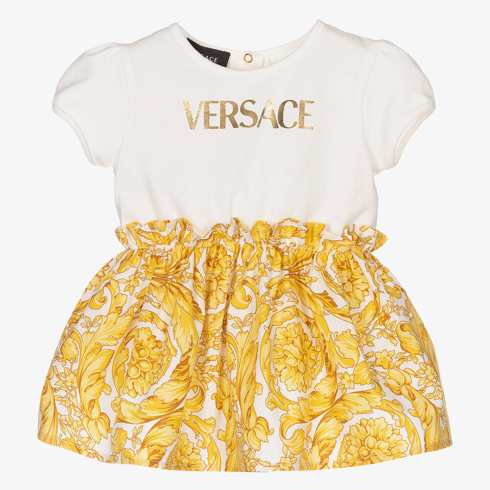 Versace - فستان قطن لون عاجي وذهبي بطبعة الباروك | Childrensalon