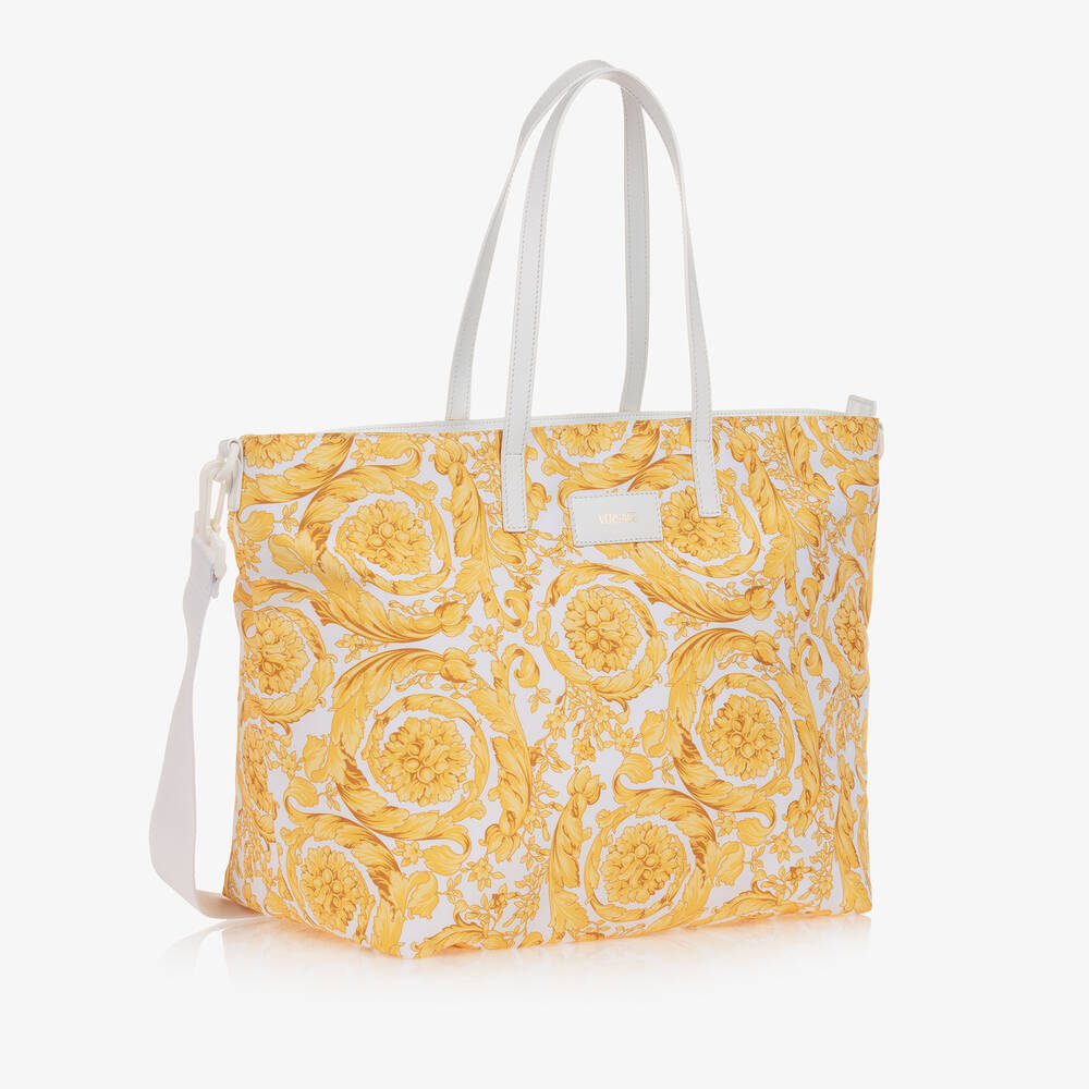 Versace-حقيبة لمستلزمات الأطفال لون أبيض وذهبي (49 سم) | Childrensalon Outlet