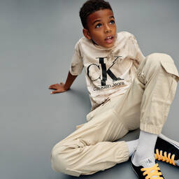 Calvin Klein Jeans-Teen Black & White Canvas Logo Trainers | Childrensalon Outlet